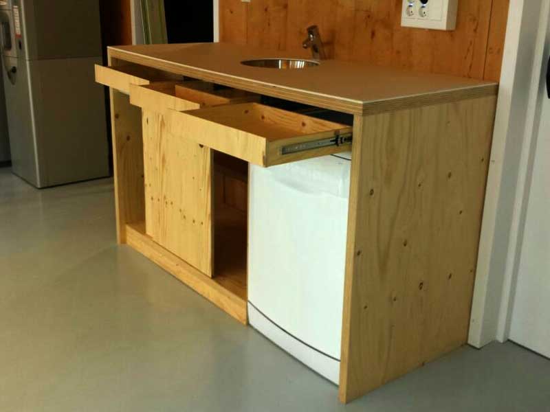 mueble de madera para aseo con lavabo